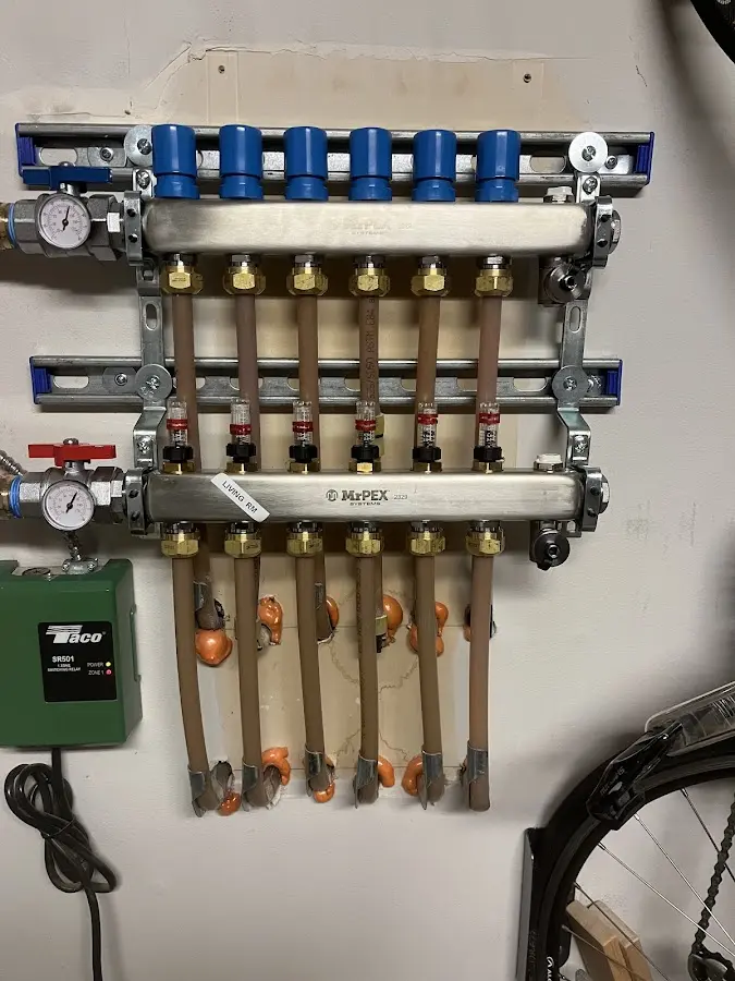 Plumber performing Sink Repair at a residential property in Summit